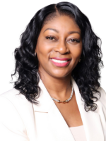 Photo of PNCB CEO Sheri Sesay-Tuffour in a white suit